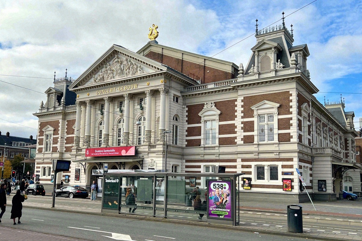 Neoclassical facade of the Concertgebouw with its golden lyre ornament