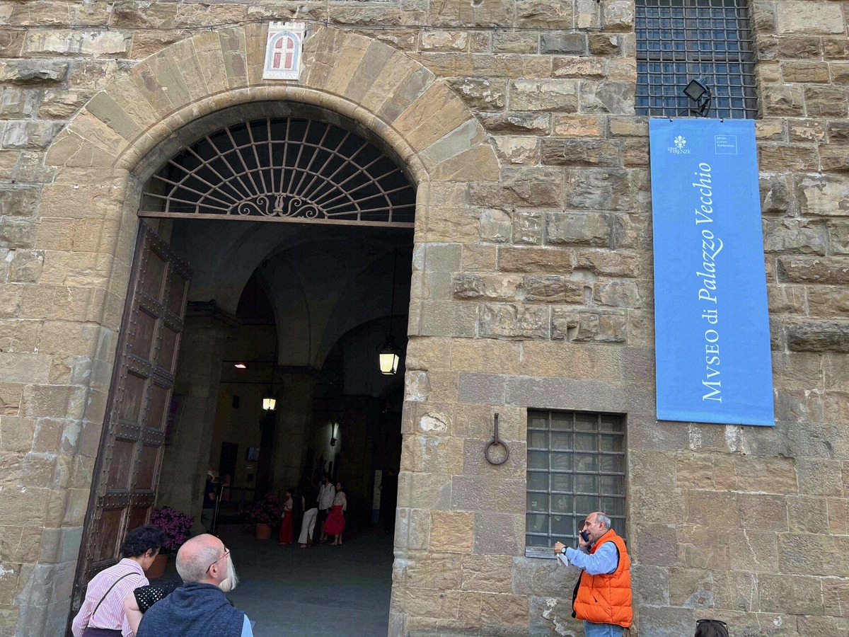 Rusticated entrance of the Palazzo Vecchio with the Florentine lily coat of arms