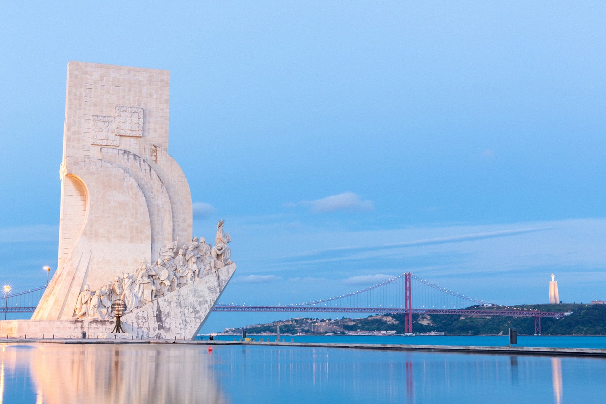 The Monument to the Discoveries in Belém with a view of the Ponte 25 de Abril over the Tagus
