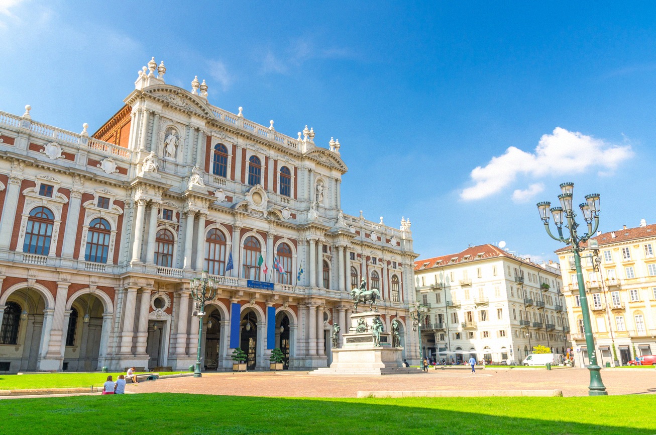 Eclectic facade of the Palazzo Carignano on Piazza Carlo Alberto with an equestrian statue