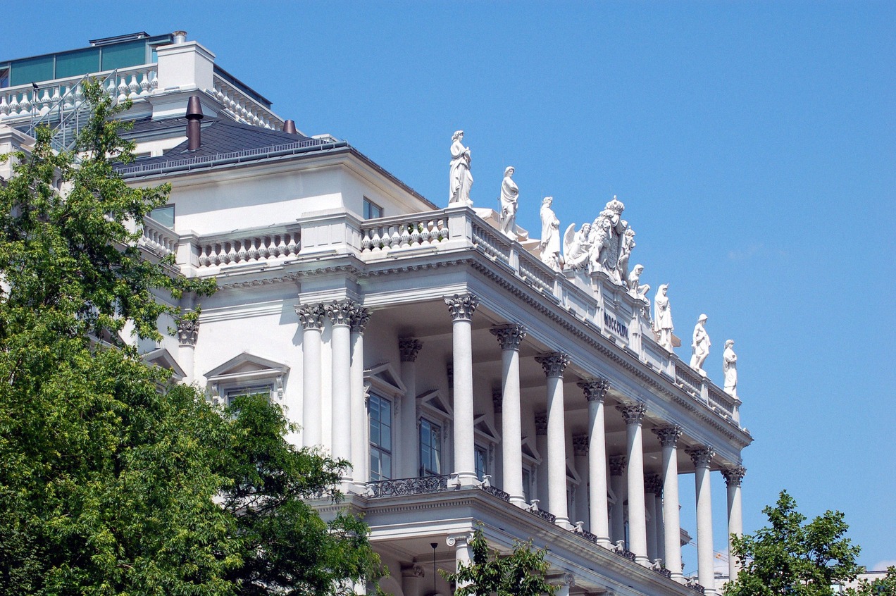Neoclassical facade on the Vienna Ringstrasse with a portico, Corinthian columns and roof sculptures